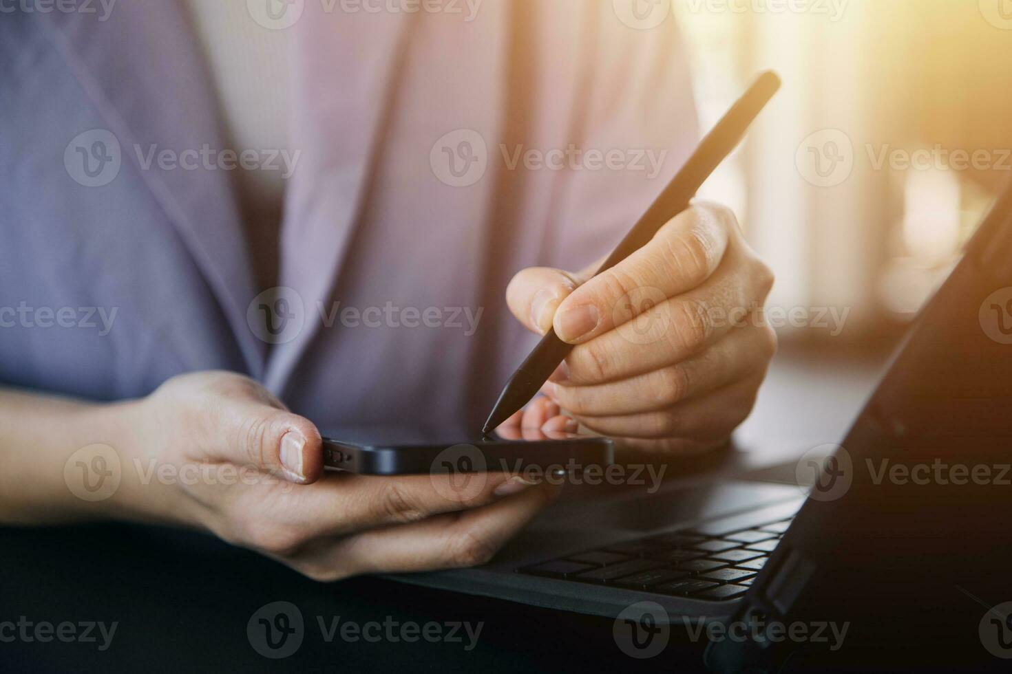 Asian Business woman using calculator and laptop for doing math finance on an office desk, tax, report, accounting, statistics, and analytical research concept photo