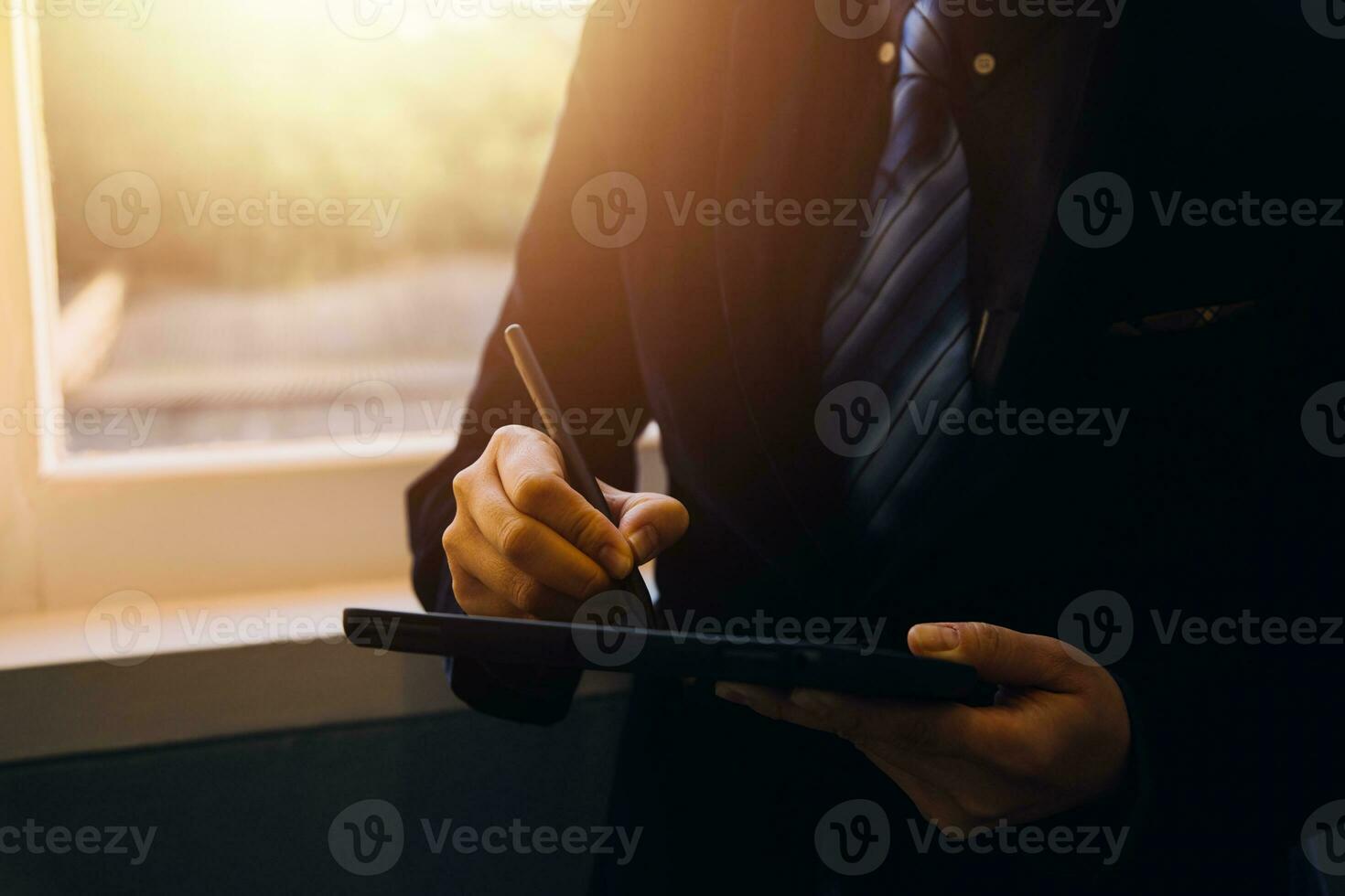 Asian Business woman using calculator and laptop for doing math finance on an office desk, tax, report, accounting, statistics, and analytical research concept photo