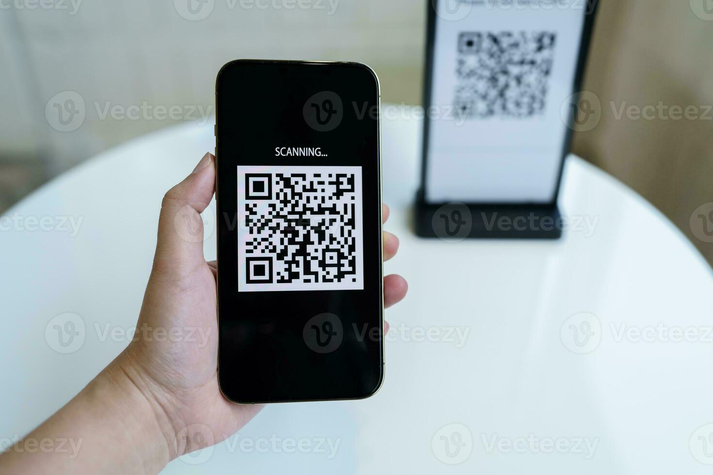 Qr code payment. E wallet. Man scanning tag accepted generate digital pay without money.scanning QR code online shopping cashless payment and verification technology concept. photo