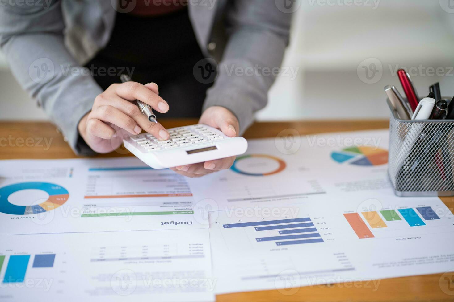 Calculating Cost Economic budget saving and investment concept analyzing investment charts and calculator Accounting Concept photo