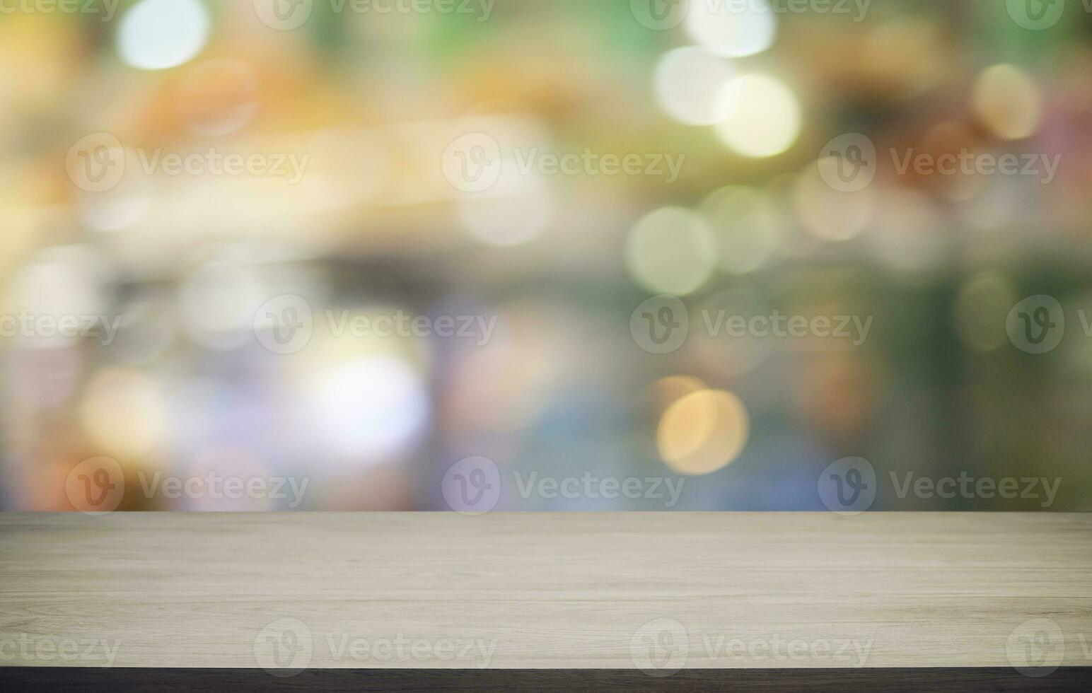 Wood Table Top in Blur Background room interior with empty copy space. photo