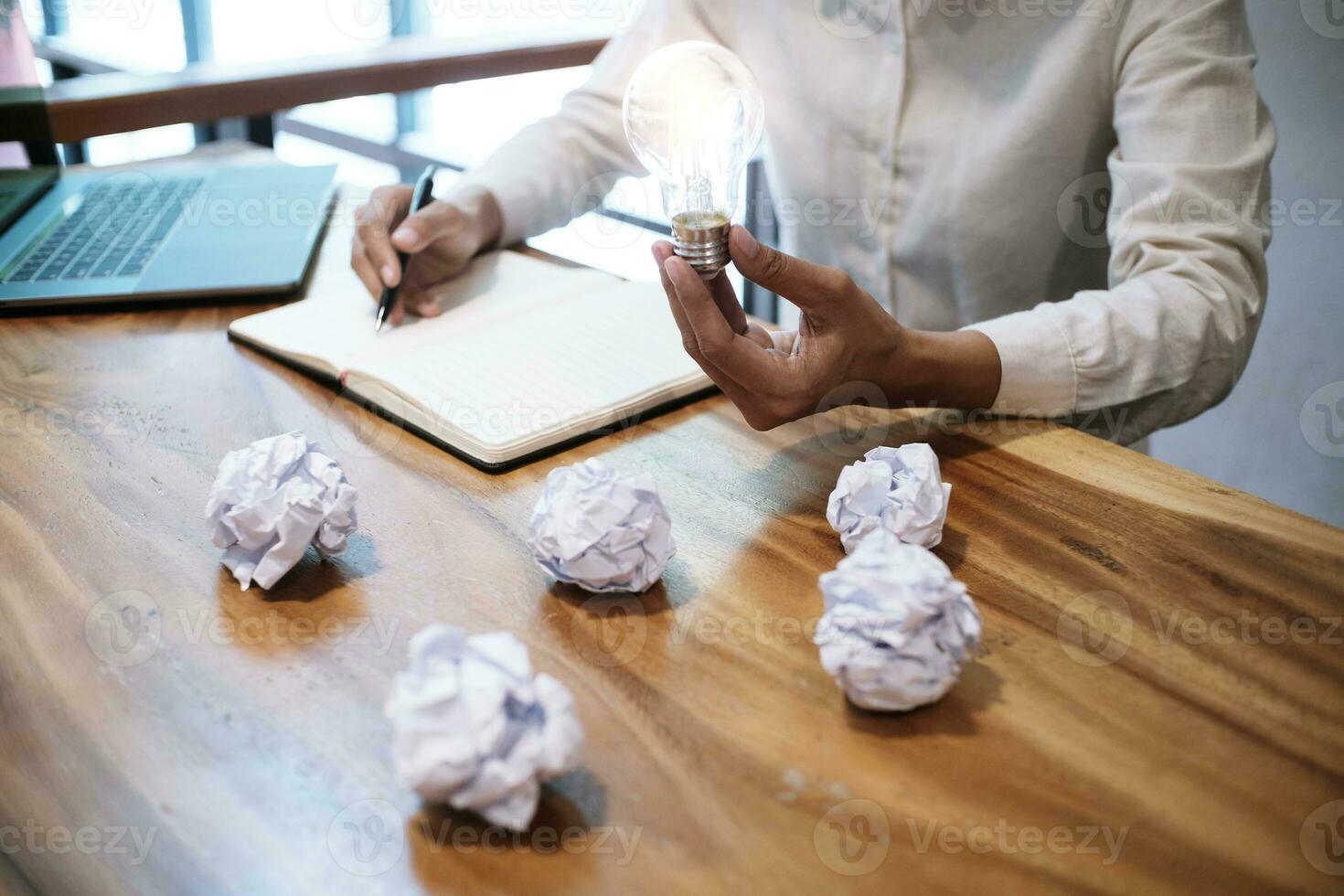 Creative idea Business women holding light bulbs Concept of idea technology and creativity photo