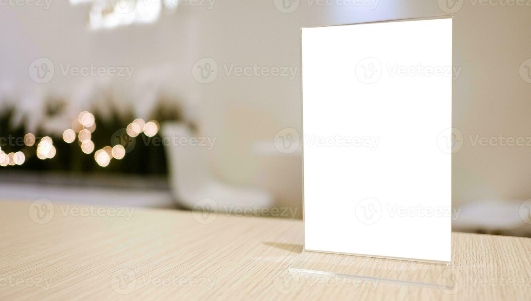 Menu frame standing on wood table in Bar restaurant cafe. space for text marketing promotion. photo