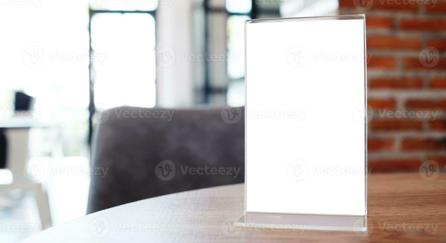 Menu frame standing on wood table in Bar restaurant cafe. space for text marketing promotion. photo