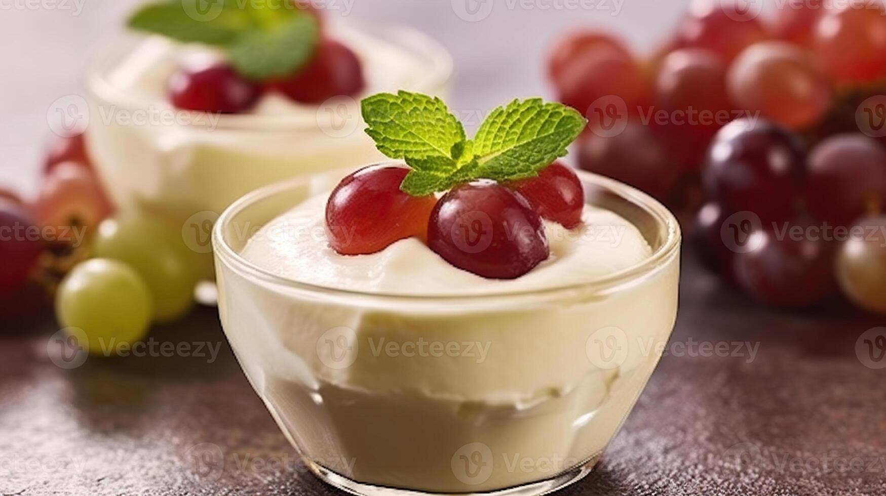 Delicious Vanilla Cooked Cream Yogurt with Fruit Thickened with Gelatin and Molded Decorated Vine Green Leaves. Panakota Sweet Grape Dessert Classic Refreshment. photo