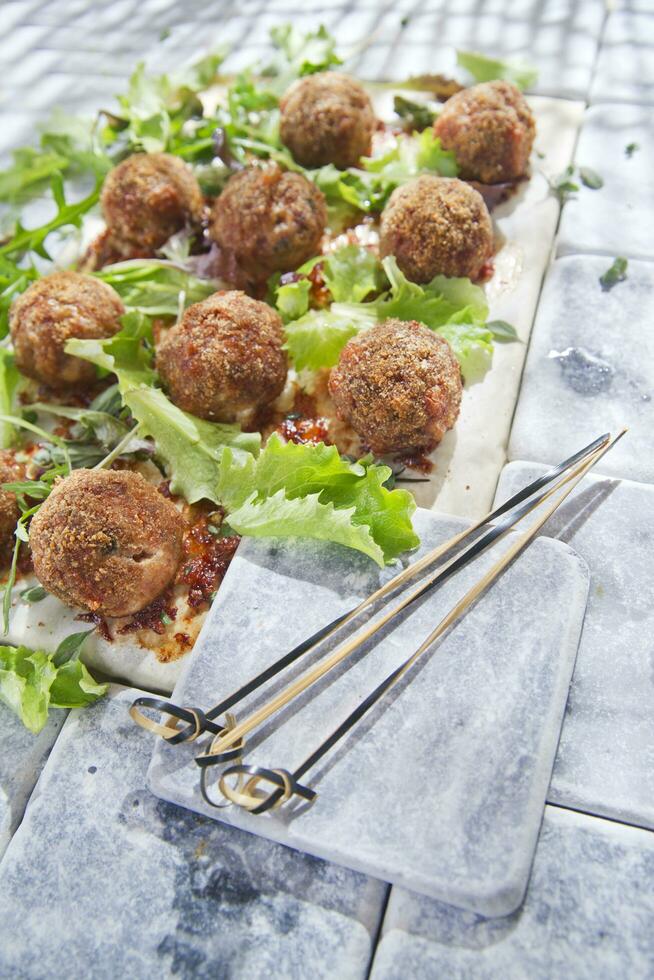 Meatballs with salad photo