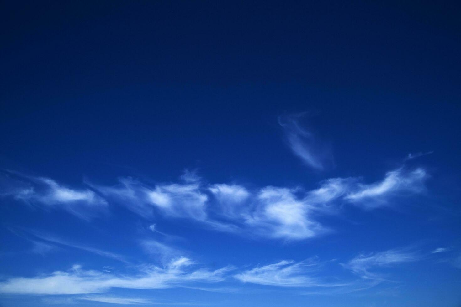 Blue sky with white clouds photo