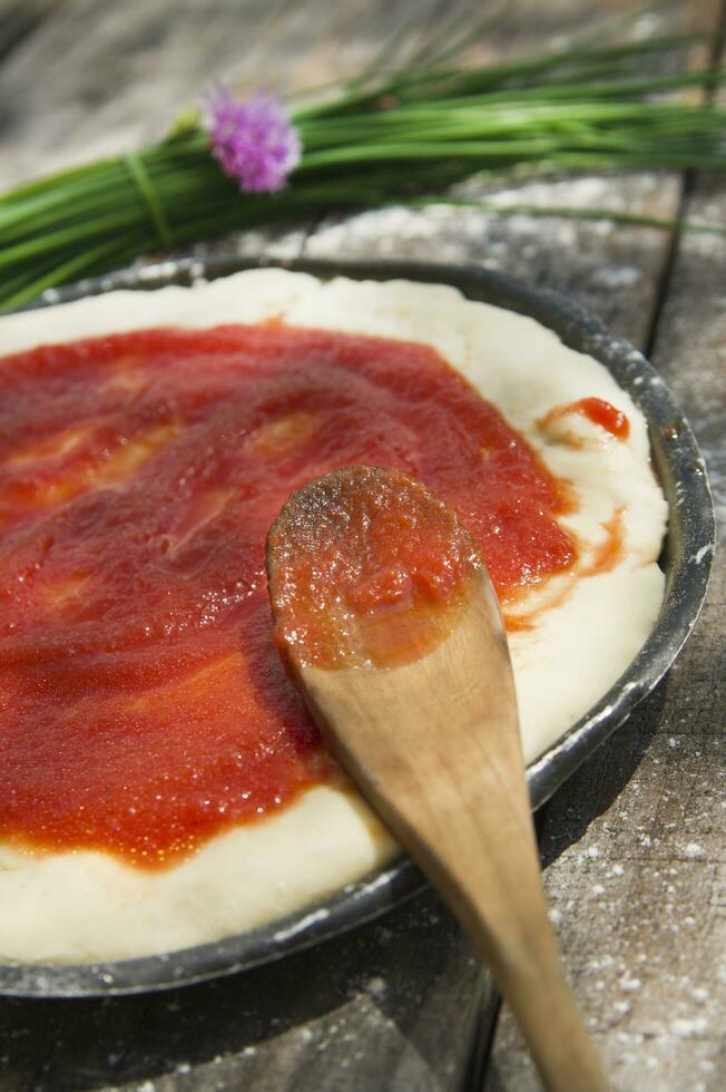 Raw pizza base photo