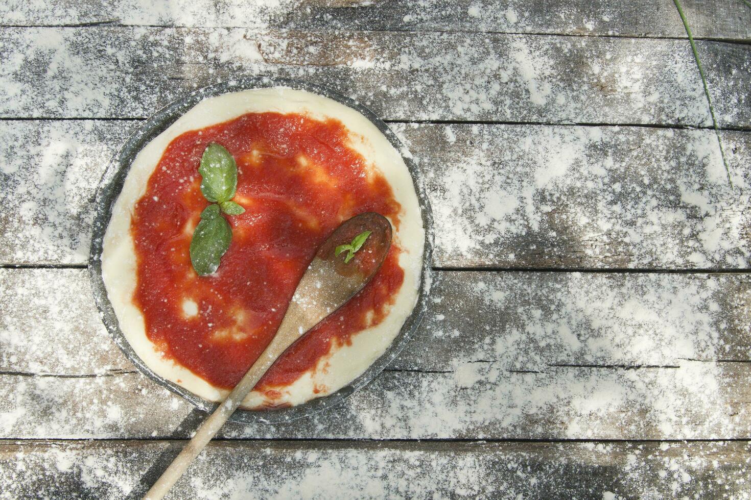 Raw pizza base photo