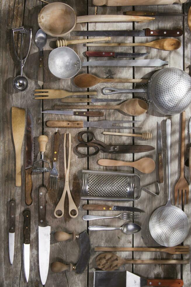 a bunch of different utensils on a table photo