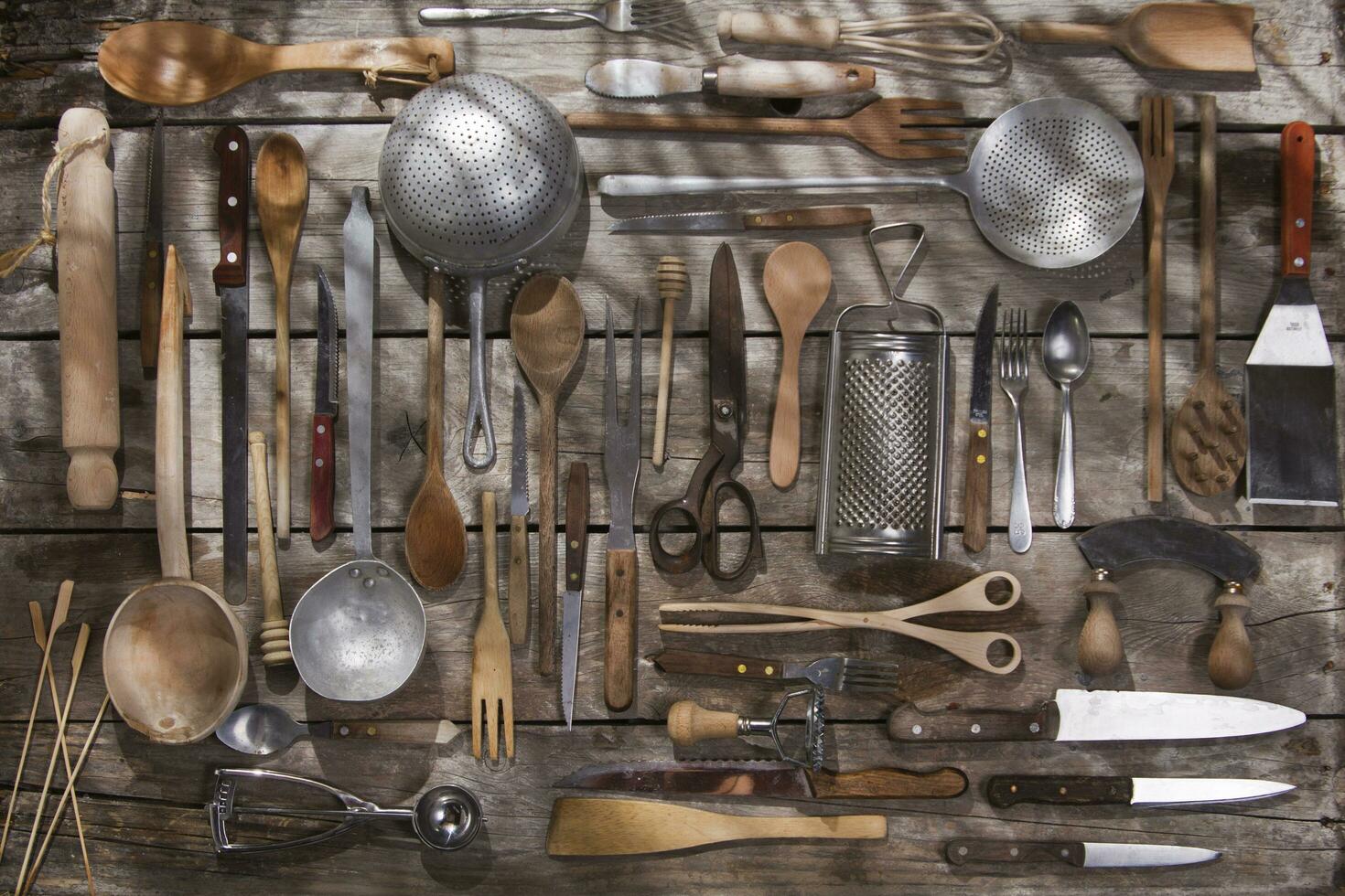a bunch of different utensils on a table photo