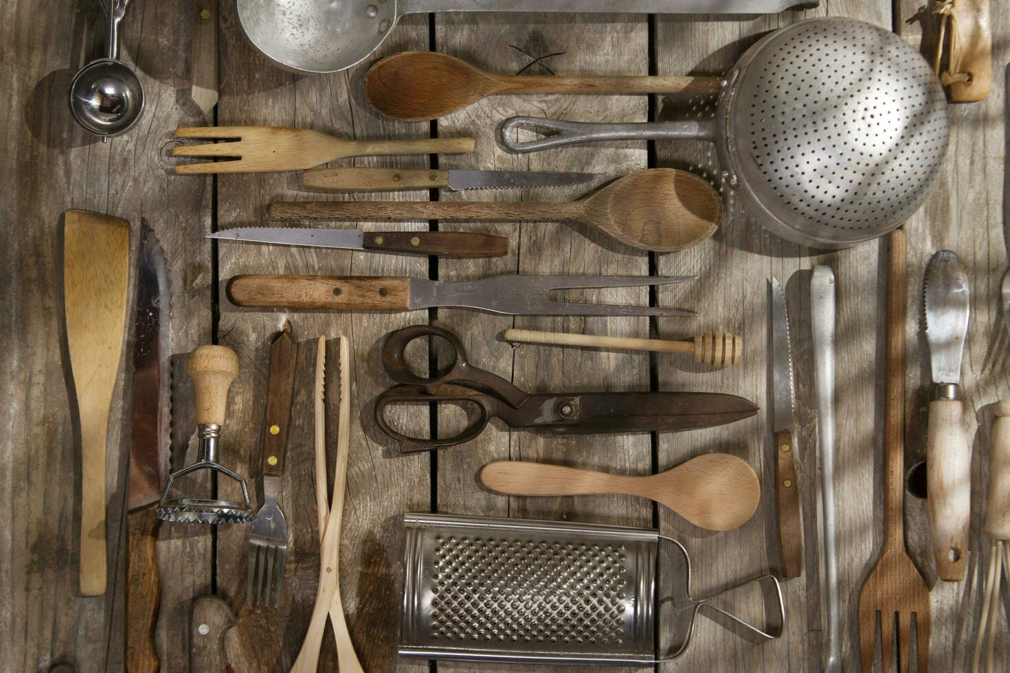 a bunch of different utensils on a table photo