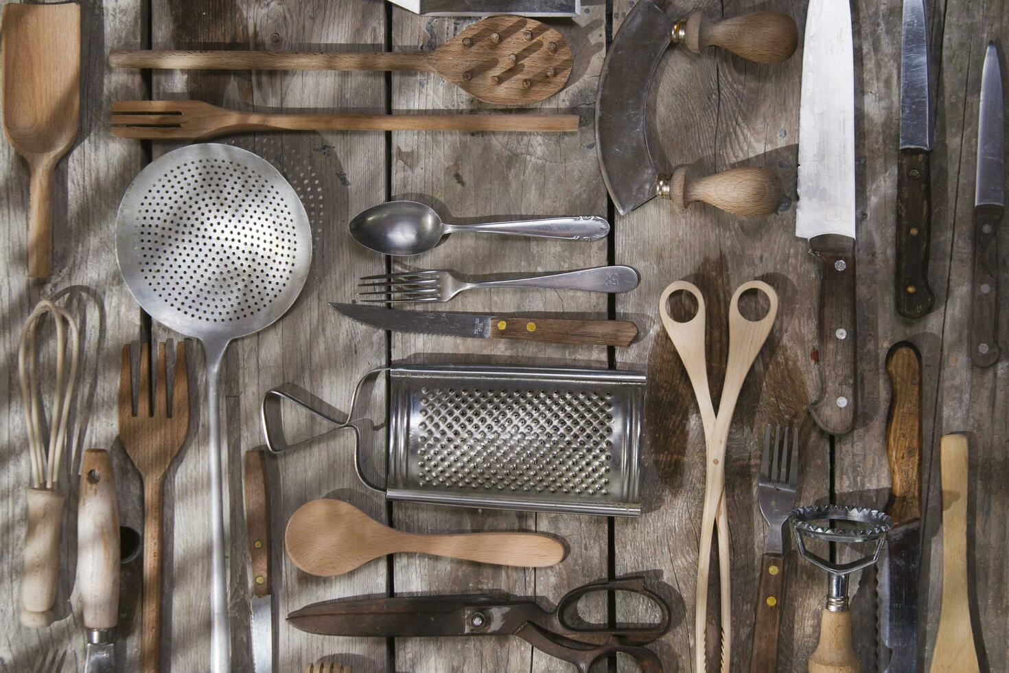 a bunch of different utensils on a table photo