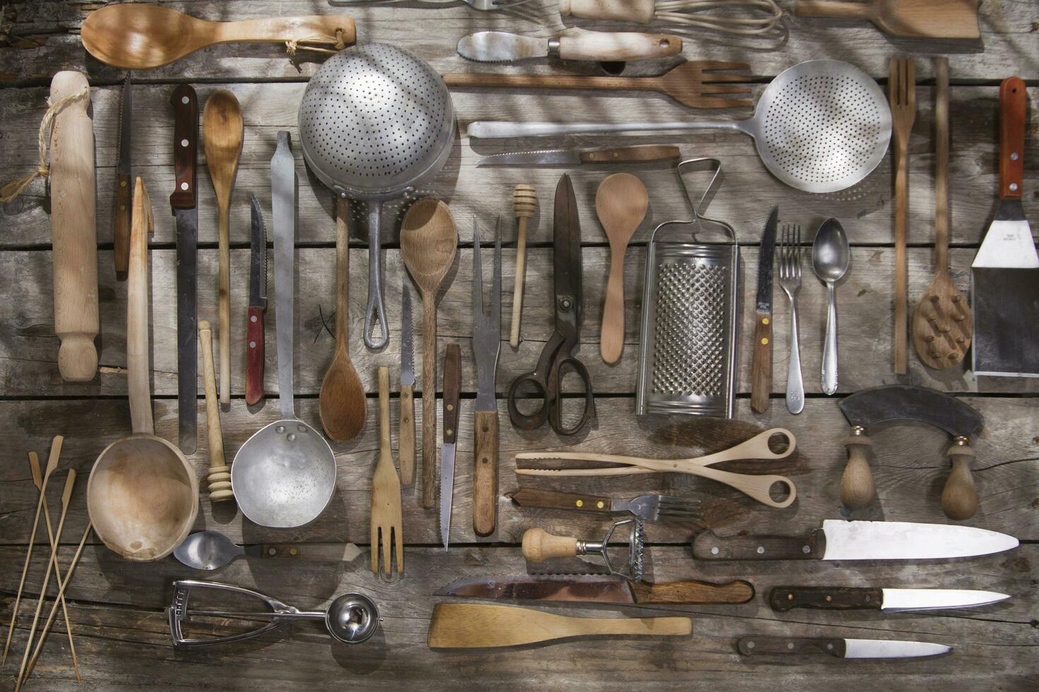 a bunch of different utensils on a table photo