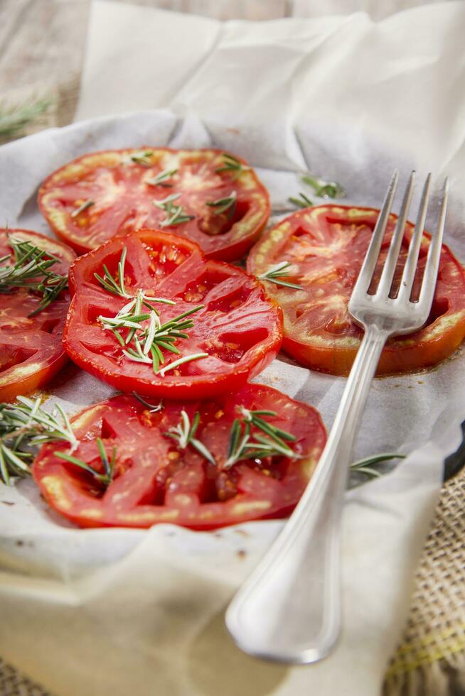 Slices of roasted tomatoes photo