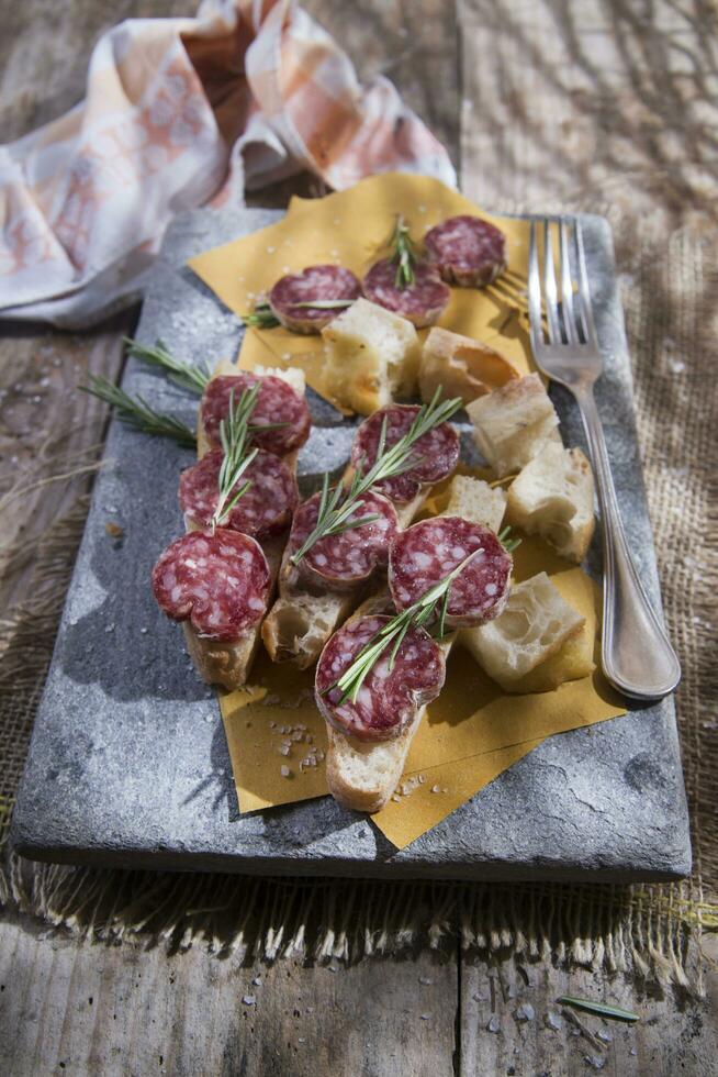 Focaccia and salami photo