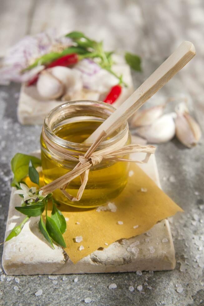 Olive oil, garlic and chili photo