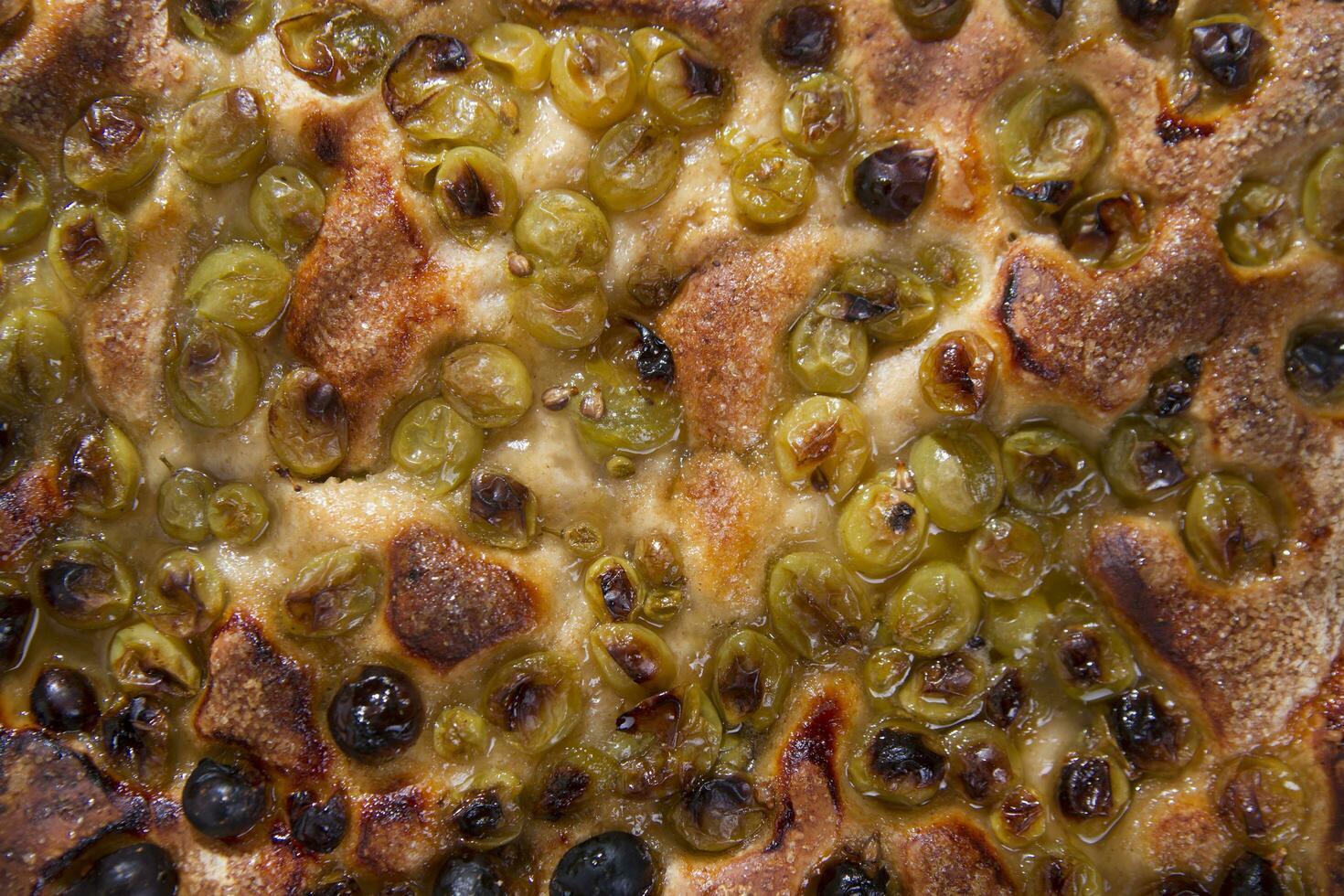 Focaccia with grapes strawberry white photo