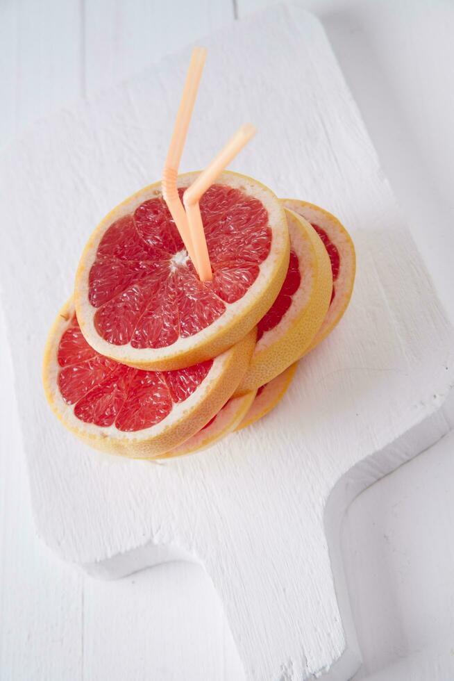 Slices of red grapefruit photo