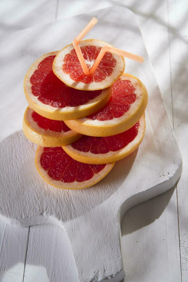 Slices of red grapefruit photo