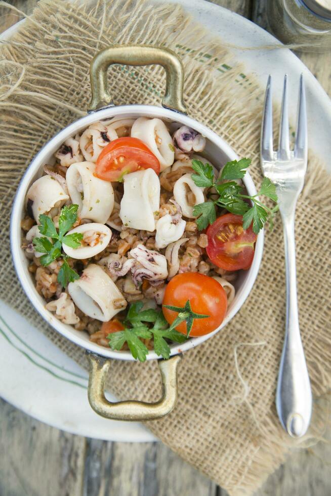 Farro with seafood photo