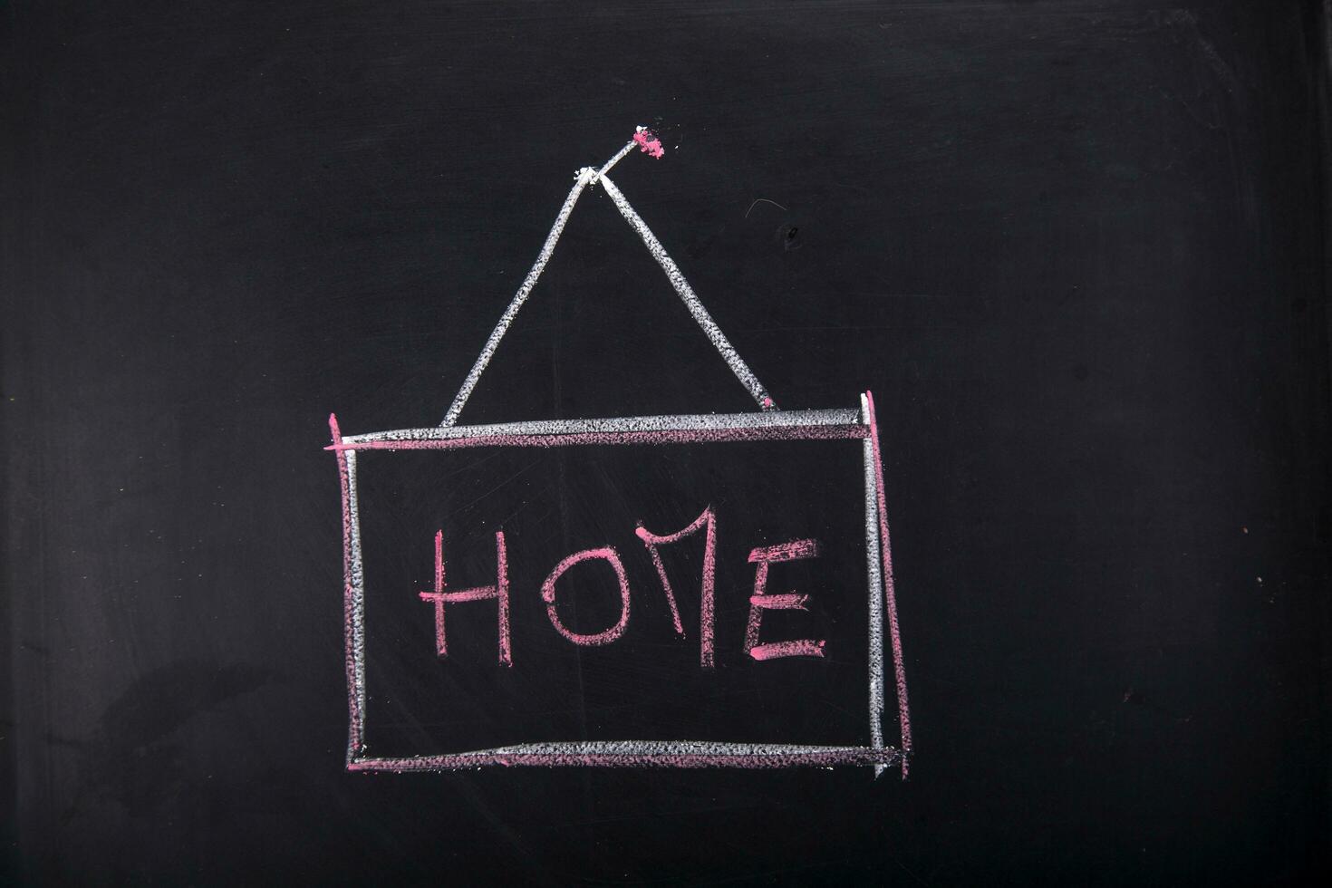 home written on a blackboard with chalk photo
