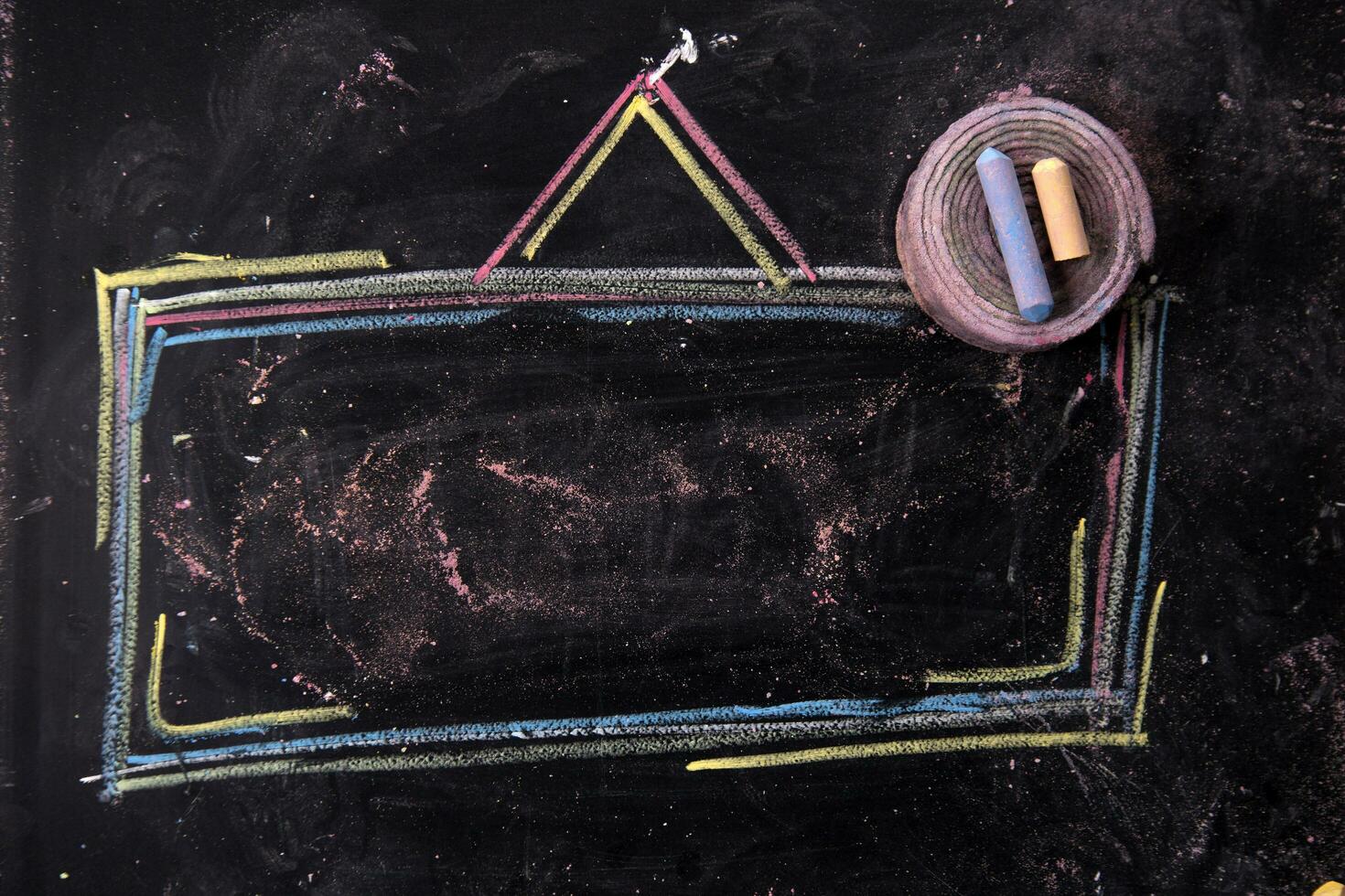 a chalk drawing of a square frame with a triangle on it photo