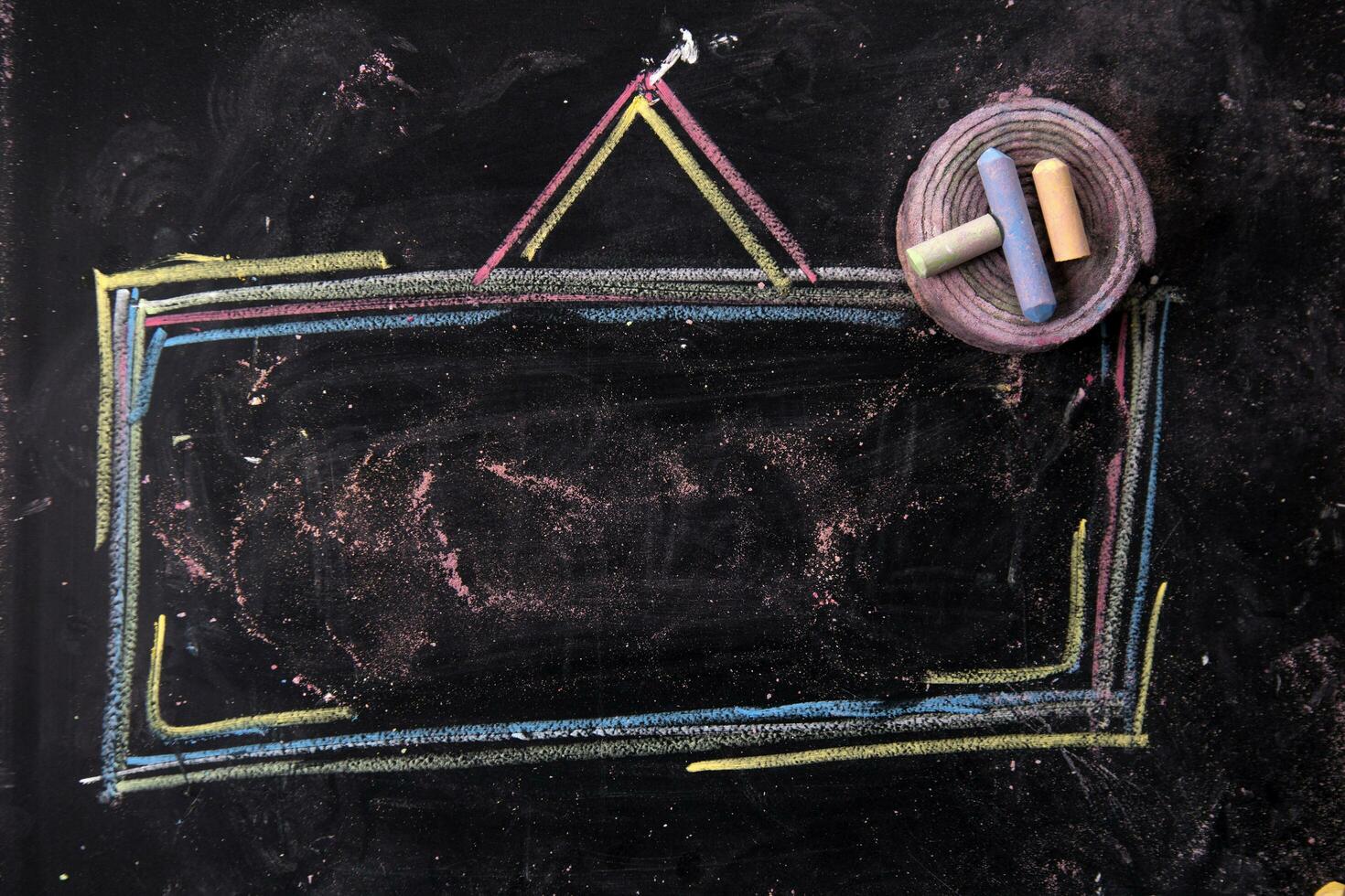 a chalkboard with a frame and a chalk drawing photo