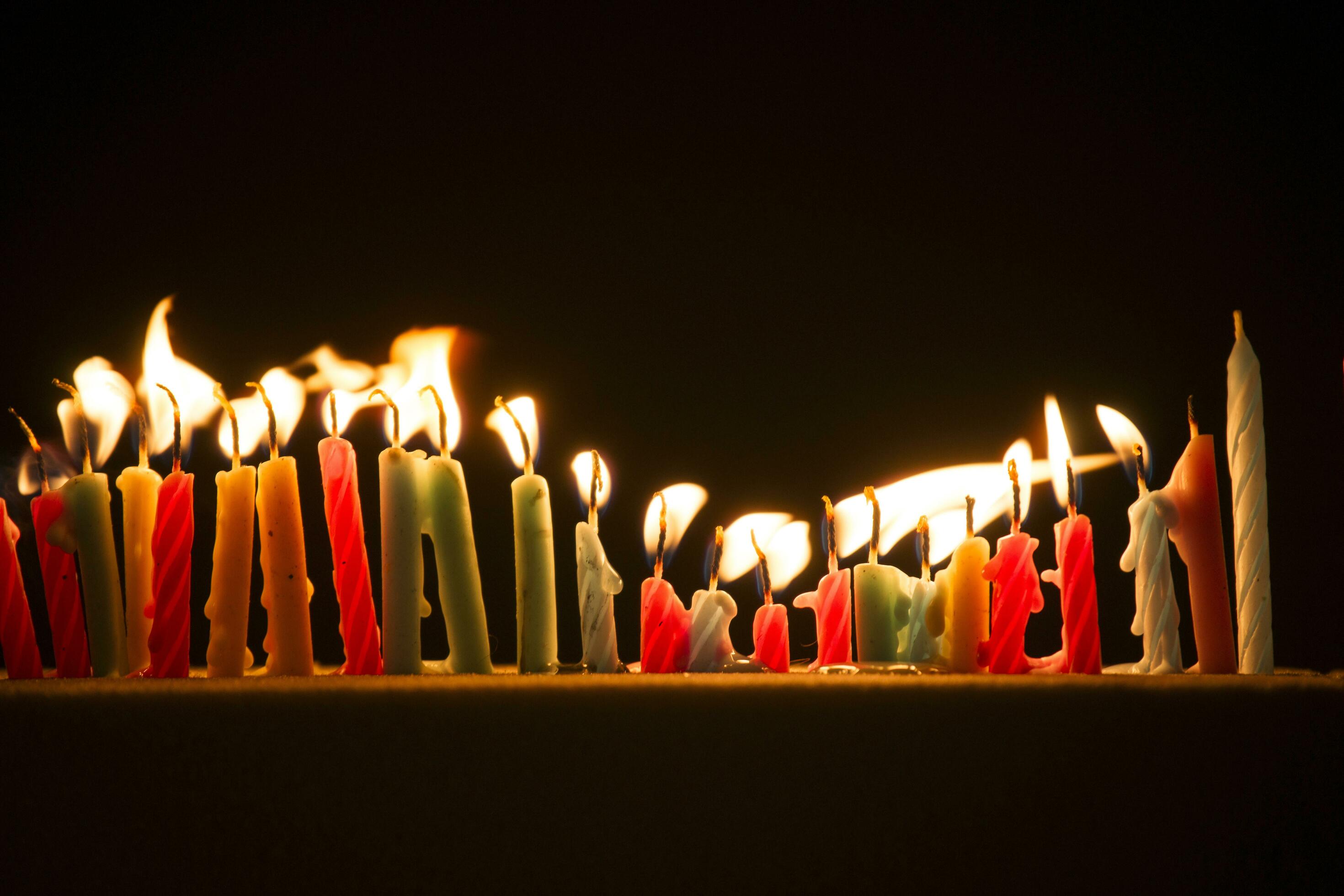 Small candles lit 27084189 Stock Photo at Vecteezy