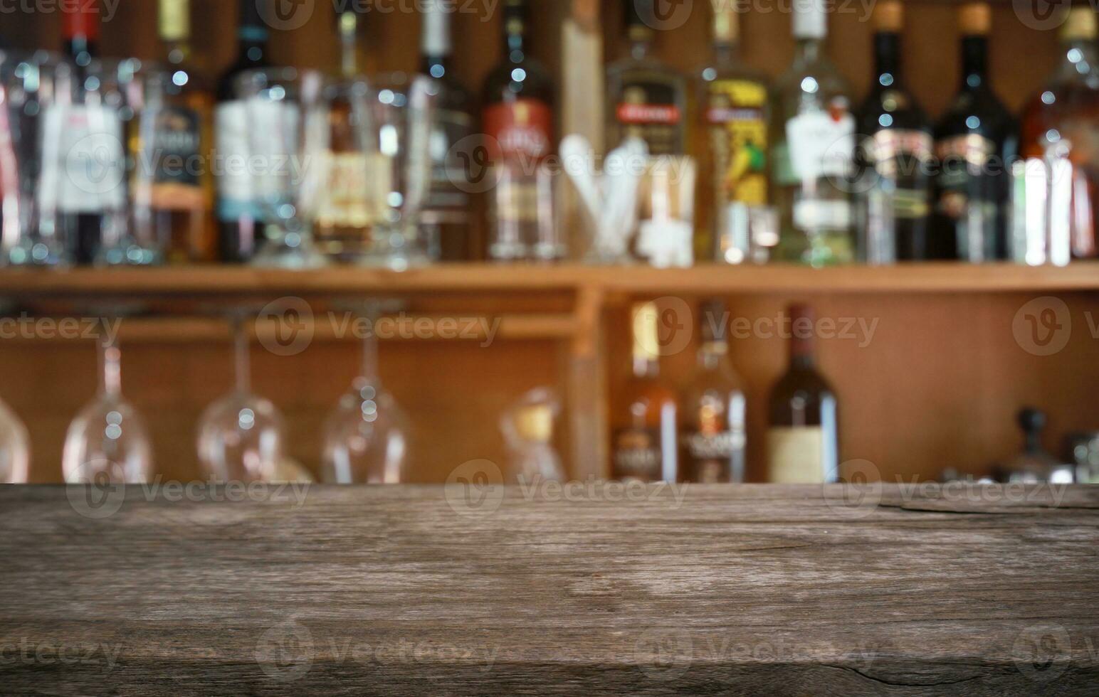 Wood Table Top in Blur Background room interior with empty copy space. photo