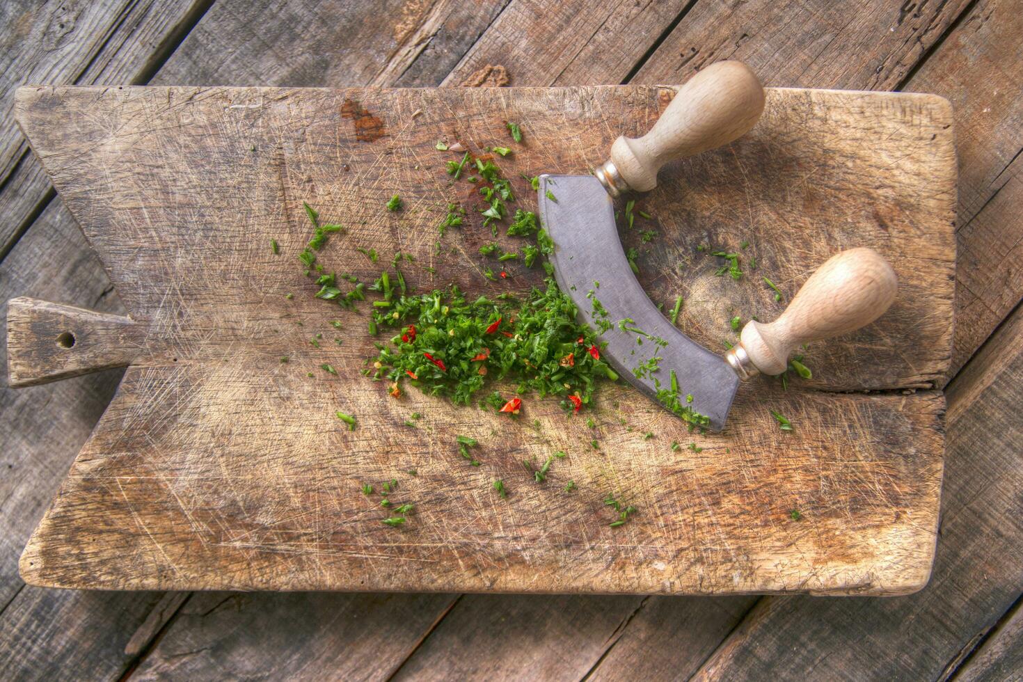 Chopped chives and chili peppers photo