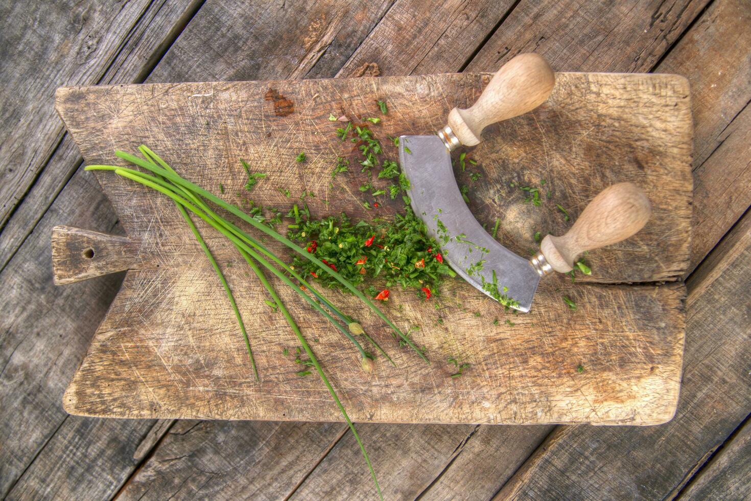 Chopped chives and chili peppers photo