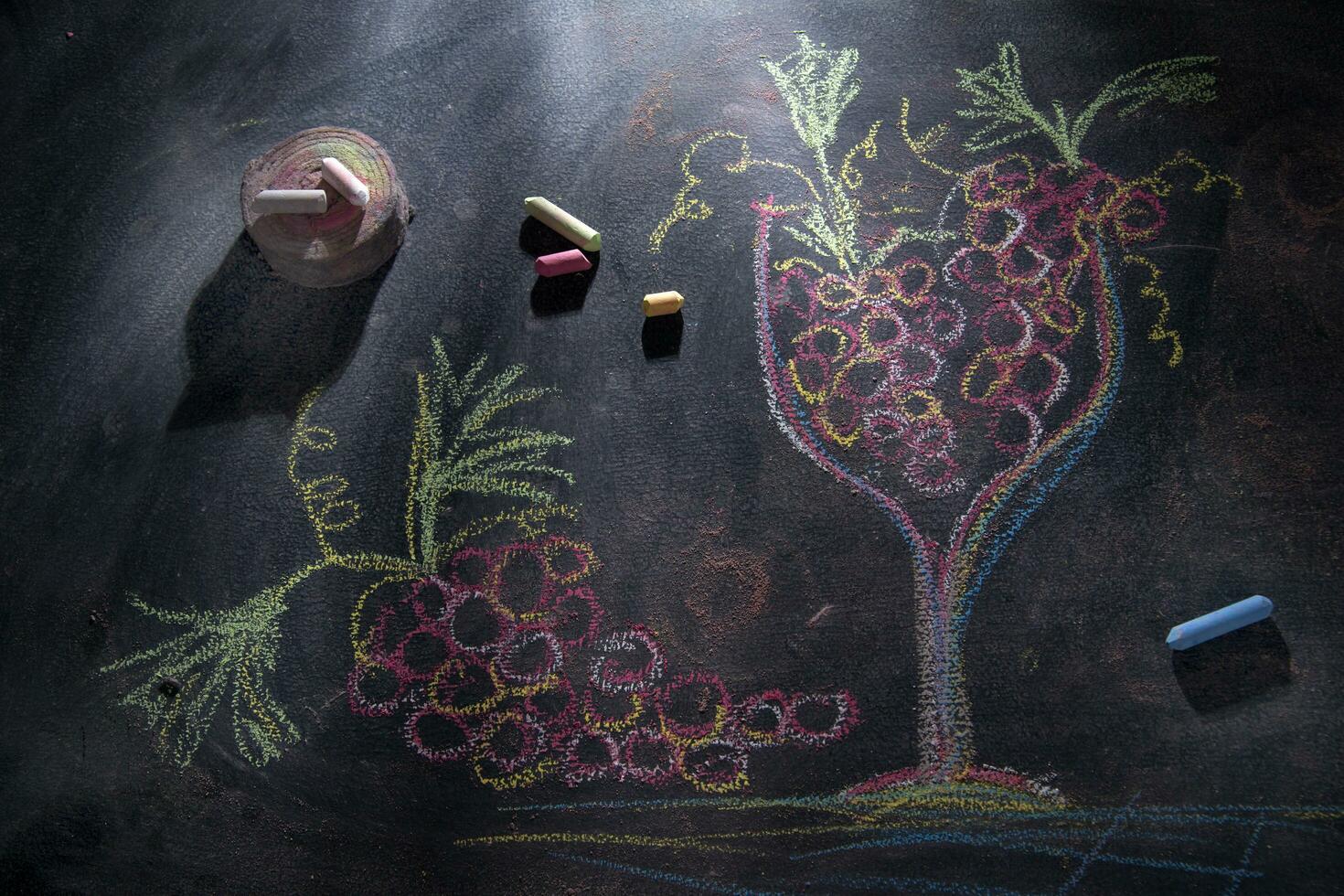 Glass with red grapes photo