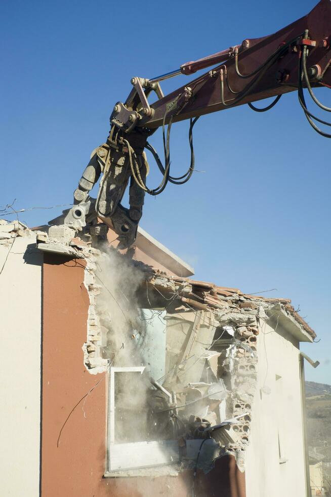 The controlled demolition of a house 27085412 Stock Photo at Vecteezy