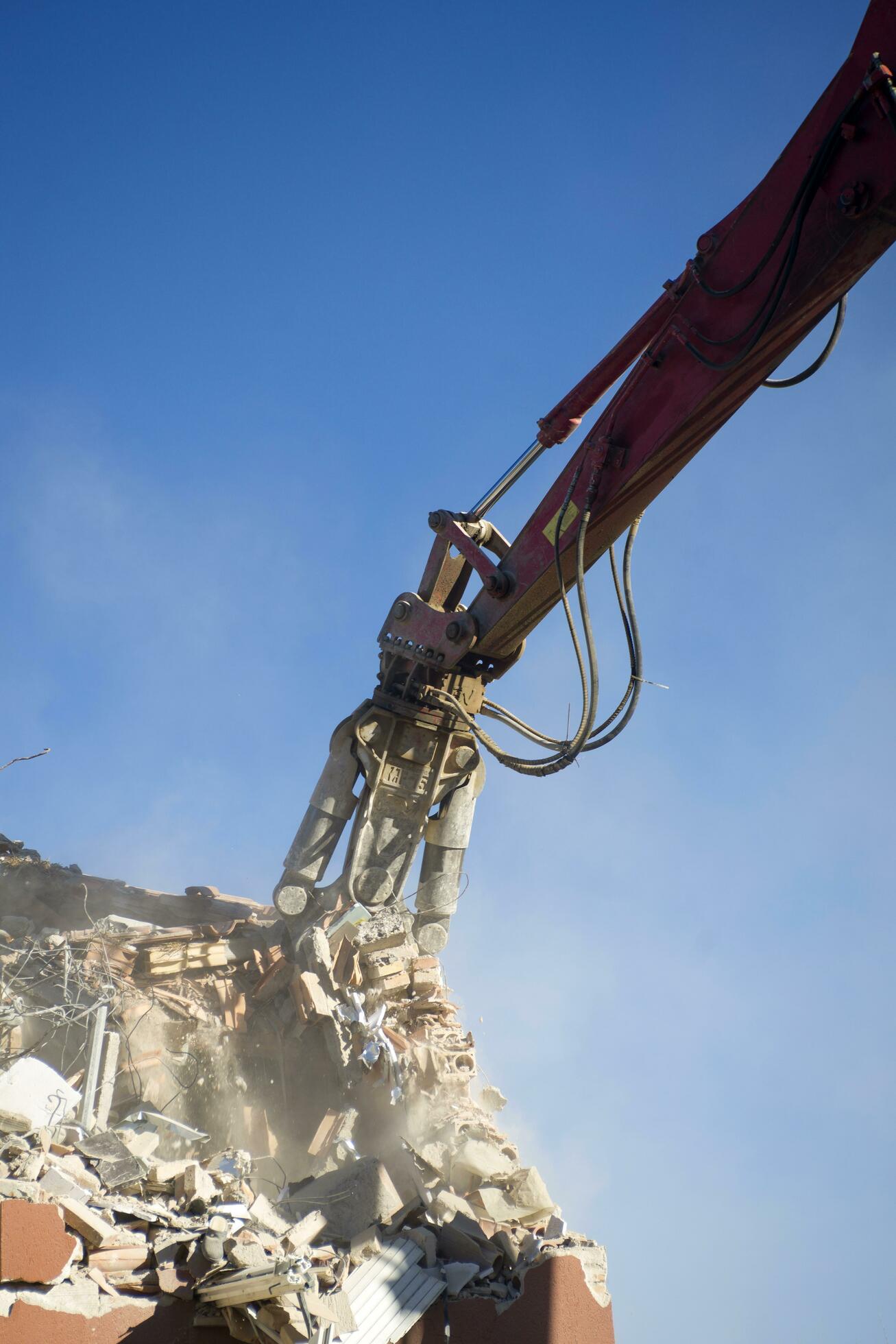 The controlled demolition of a house 27085452 Stock Photo at Vecteezy