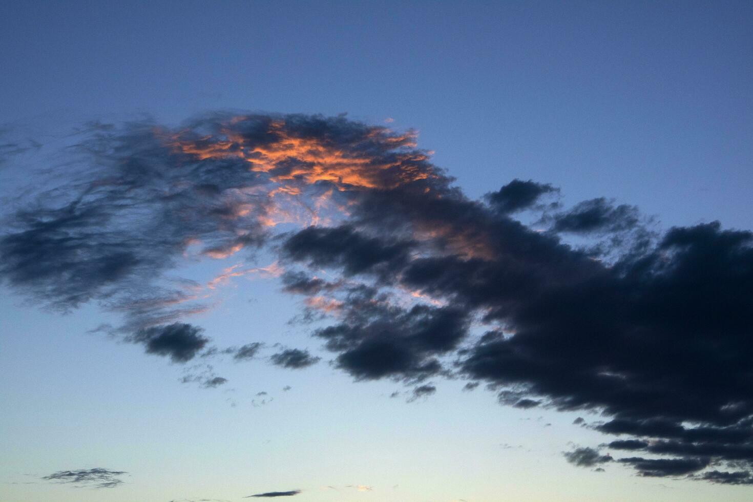 Small cloud at sunset photo