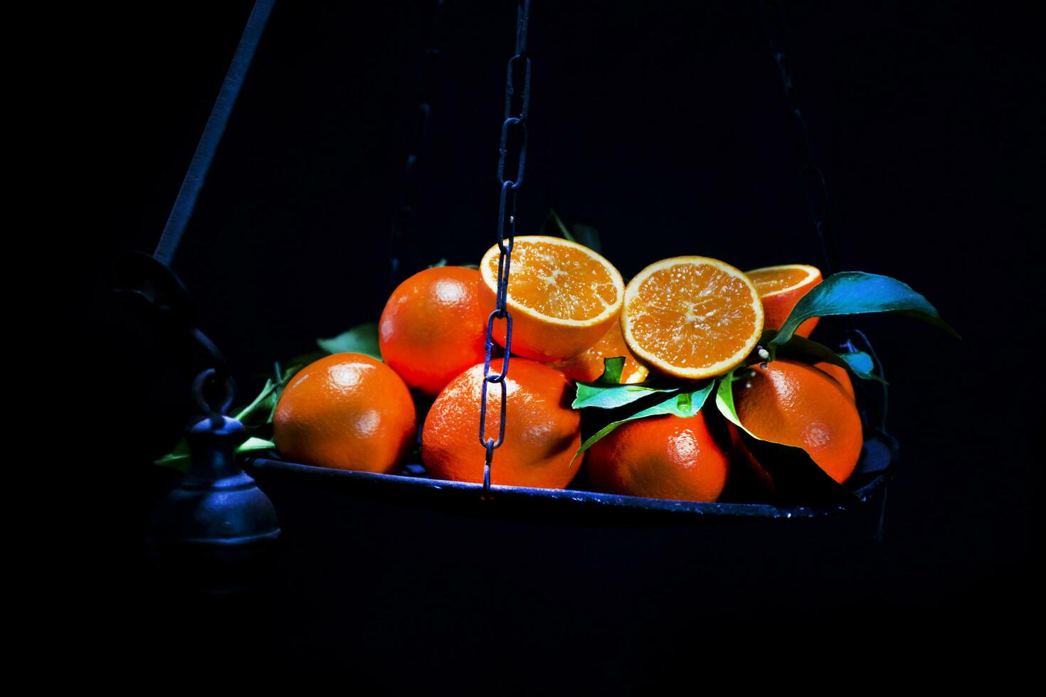 Oranges on scales photo