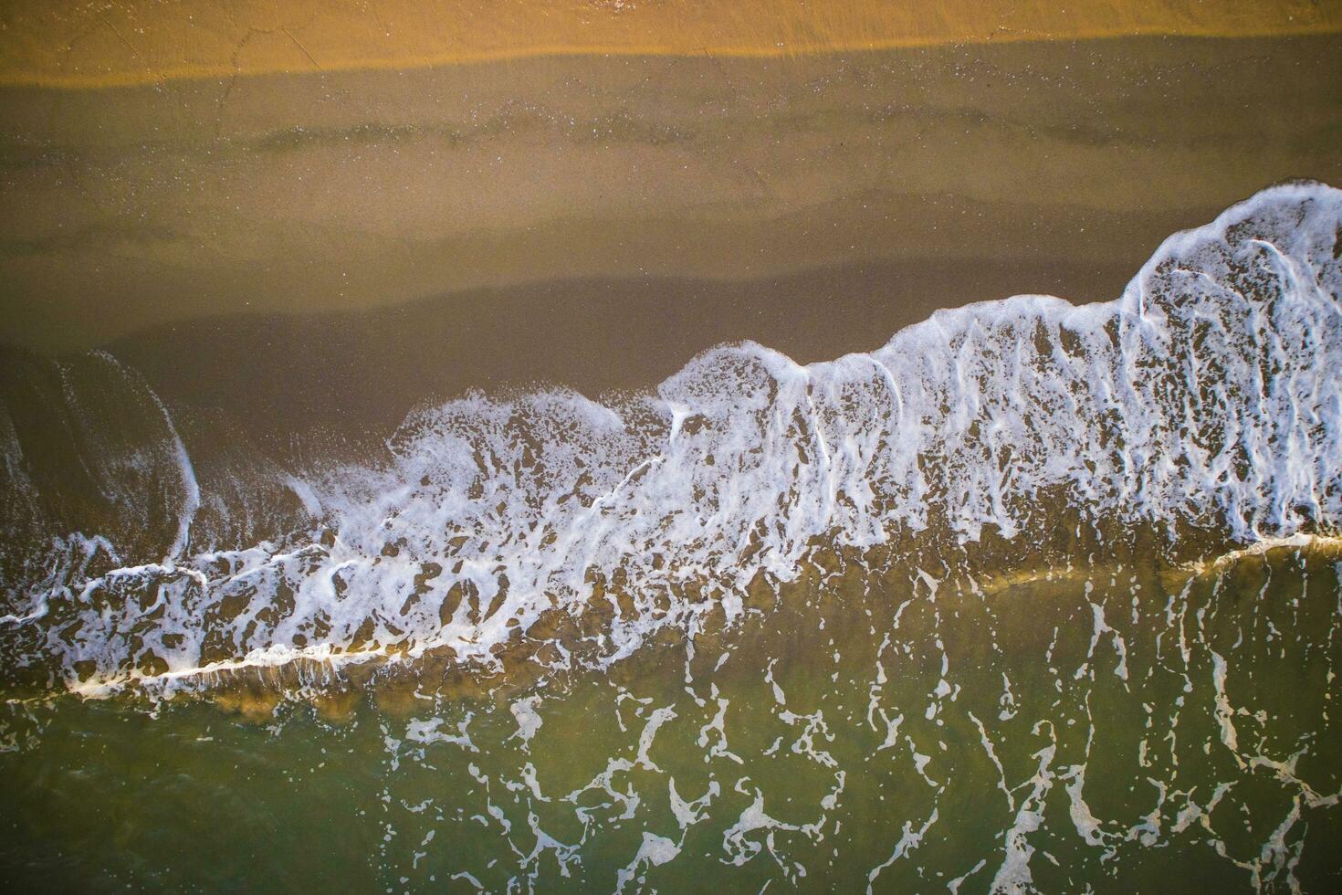 Sea waves on the beach photo