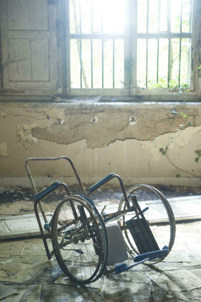 Remains of abandoned hospital photo