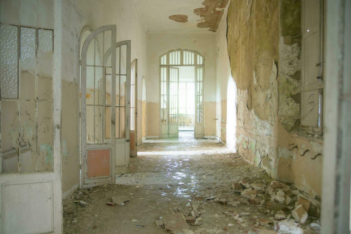 Remains of abandoned hospital photo