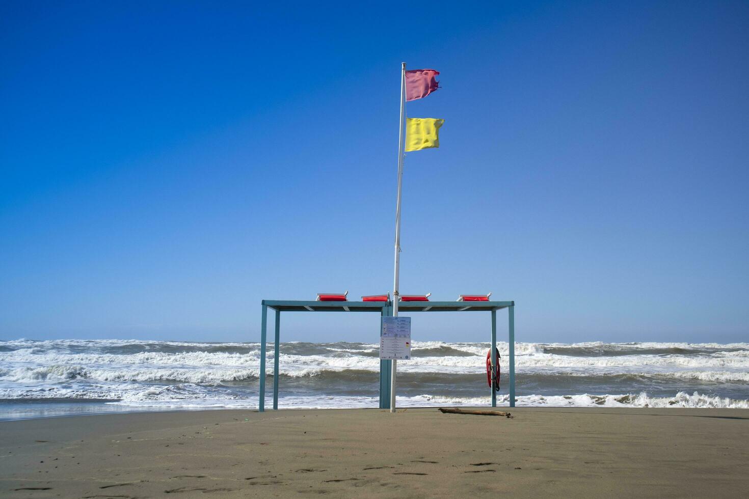 Hazard warning flags at sea photo