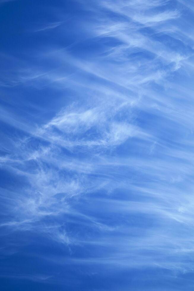 Sky with layered white clouds photo