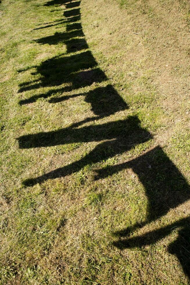 The shadow of clothes hanging photo