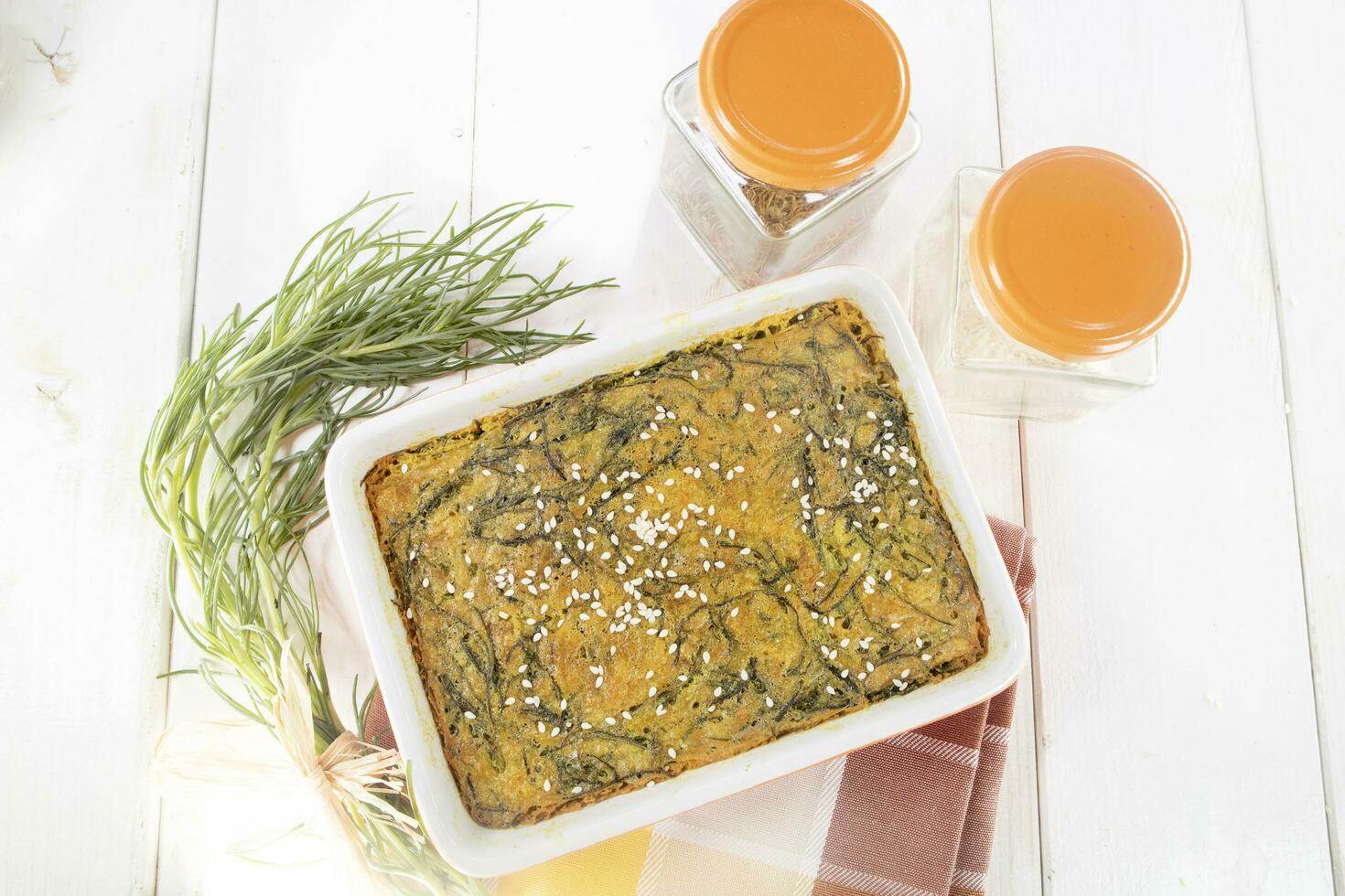 Vegan omelette cuisine with chickpea flour and agretti and turmeric photo