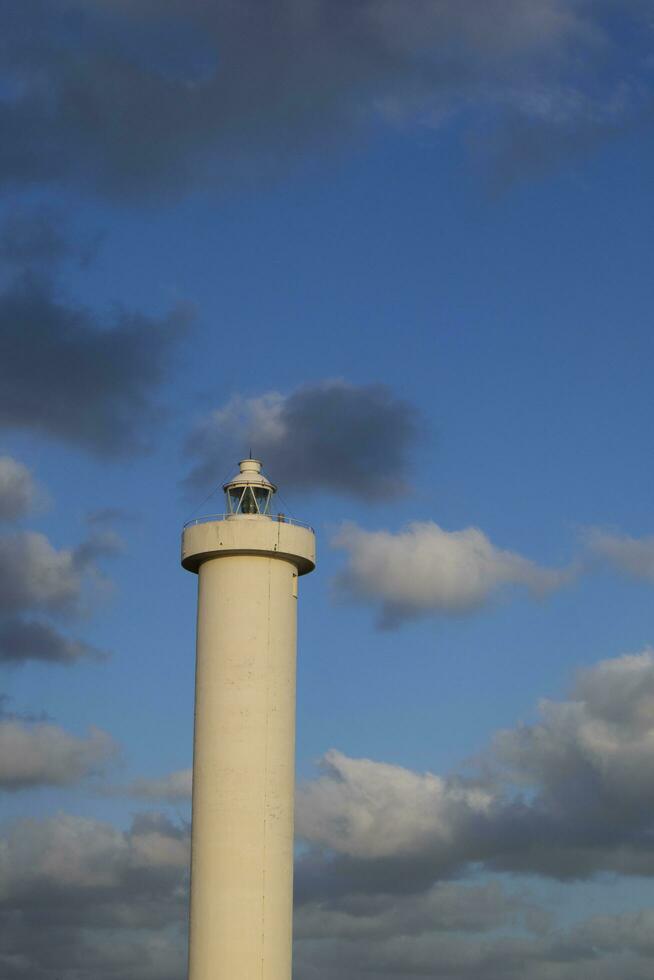 The lighthouse in the port of Viareggio Tuscany Italy photo