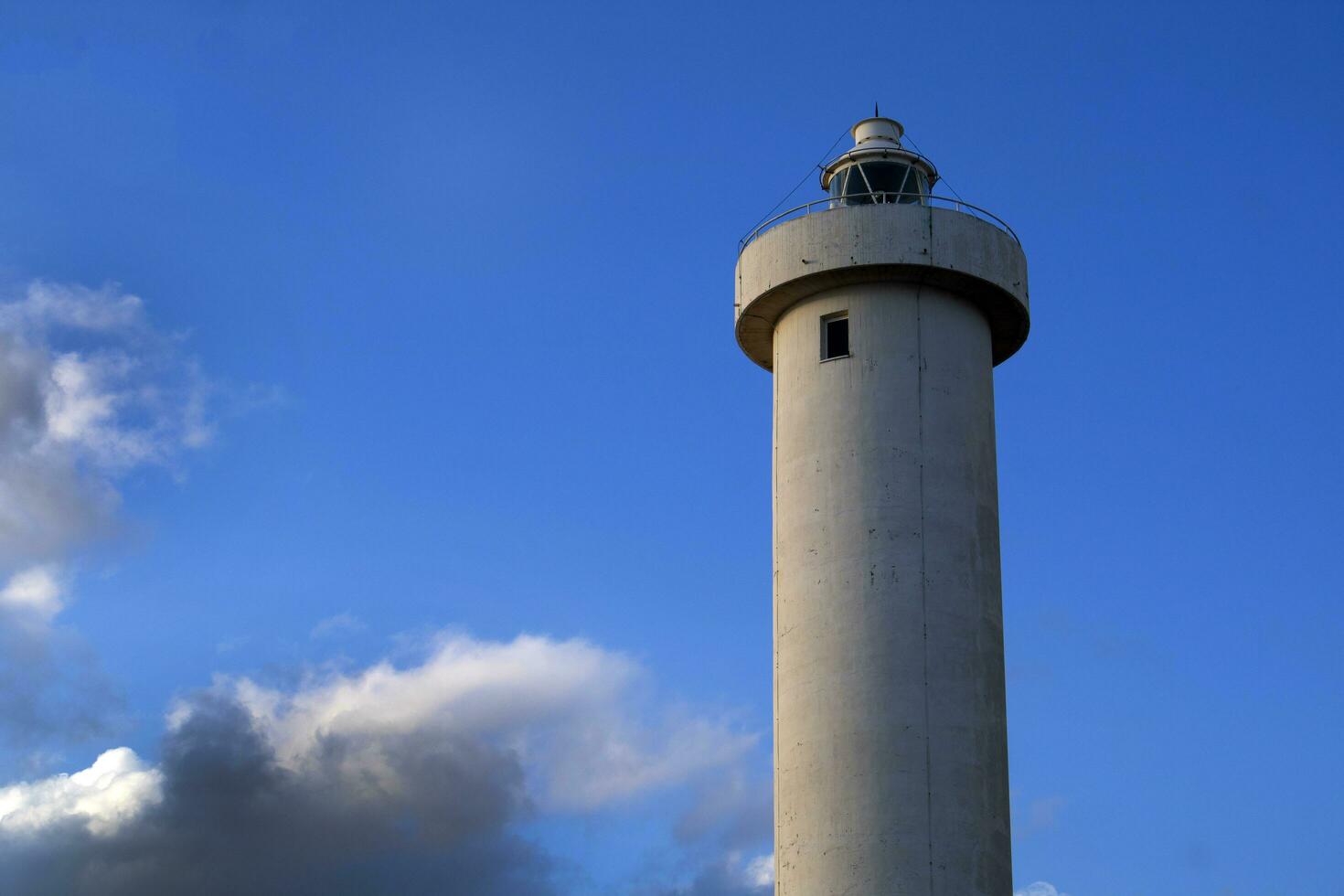 The lighthouse in the port of Viareggio Tuscany Italy photo