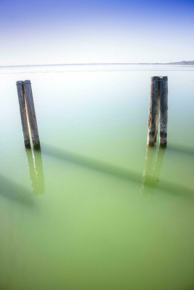 Glimpse of the peaceful Trasimeno lake in Umbria Italy photo