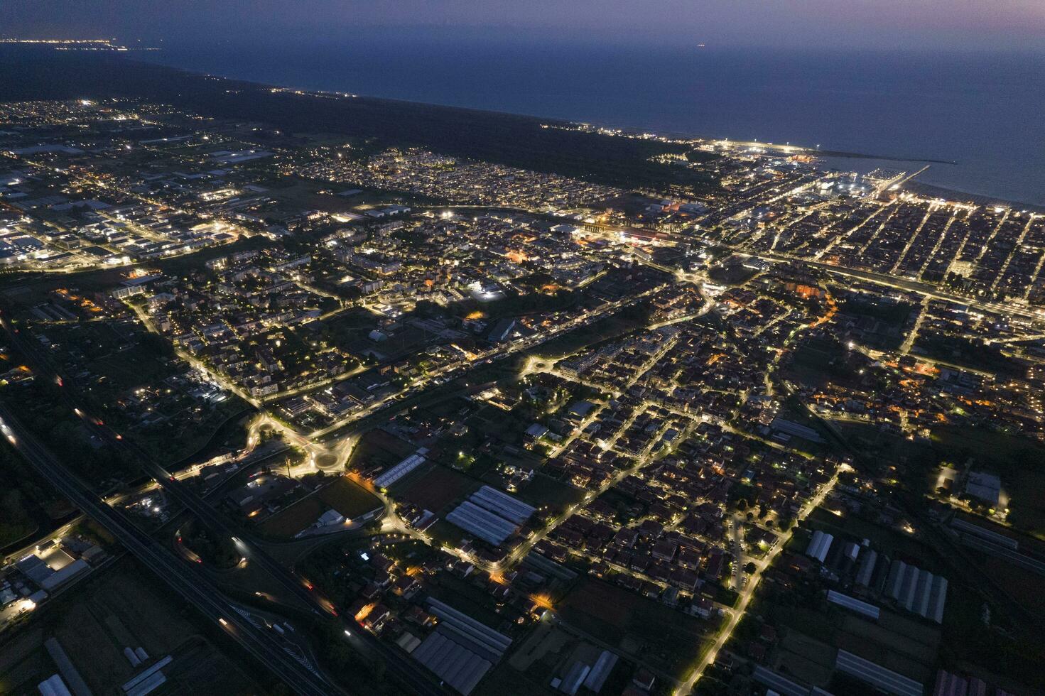 Viareggio city aerial view at night photo