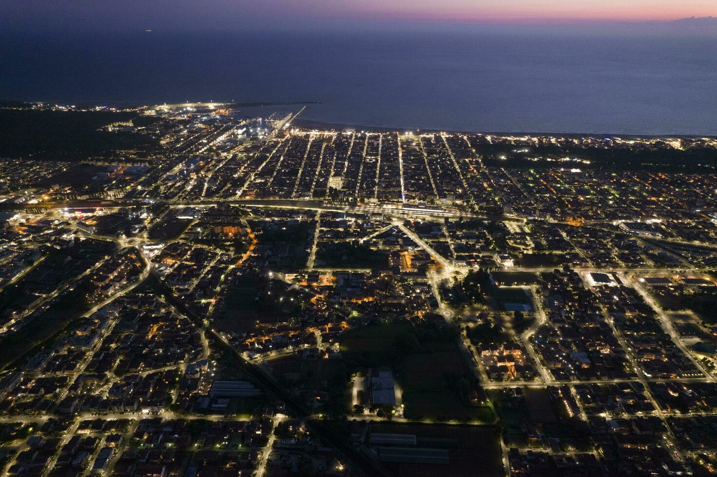 Viareggio city aerial view at night photo
