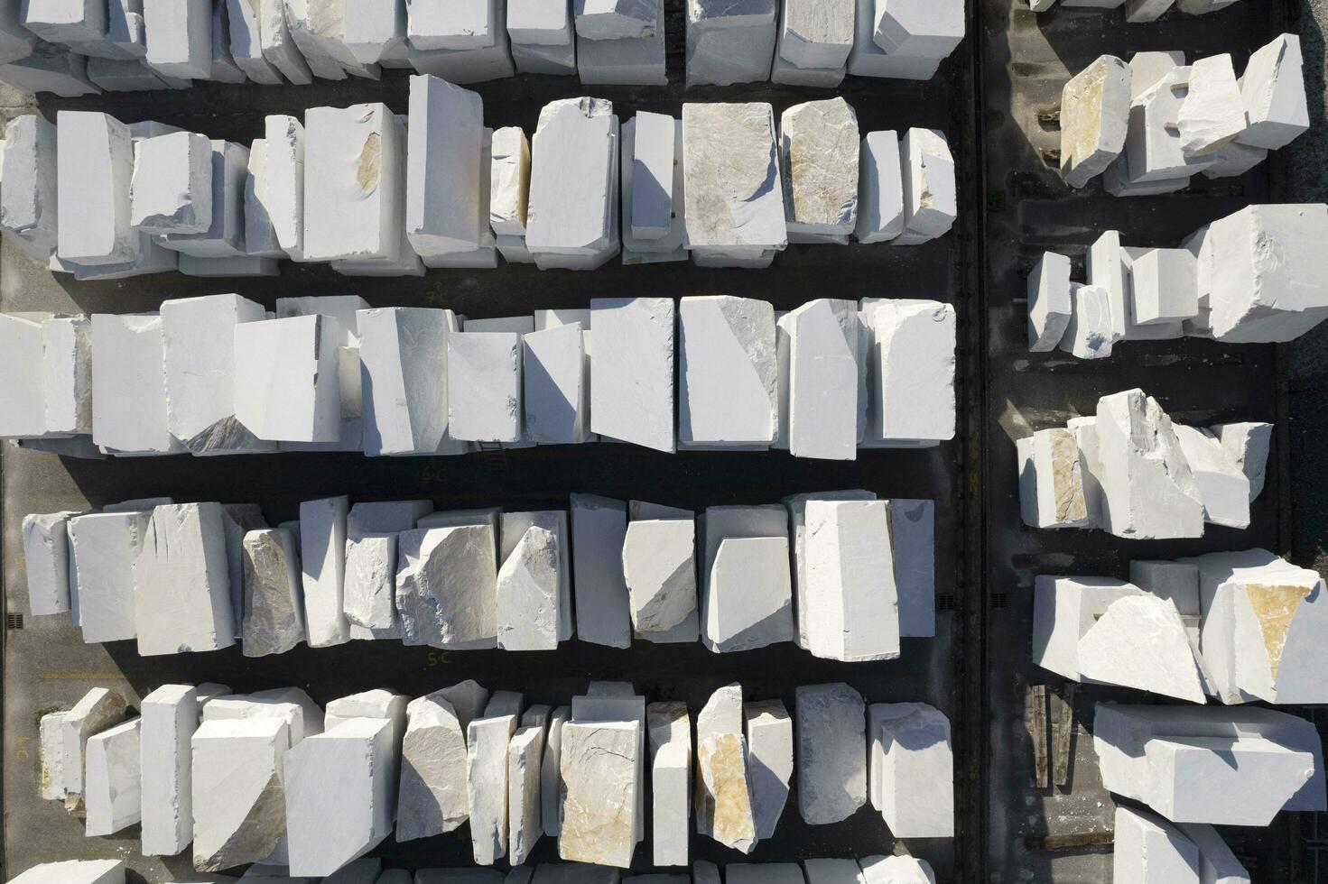 Aerial view of a storage of marble blocks photo